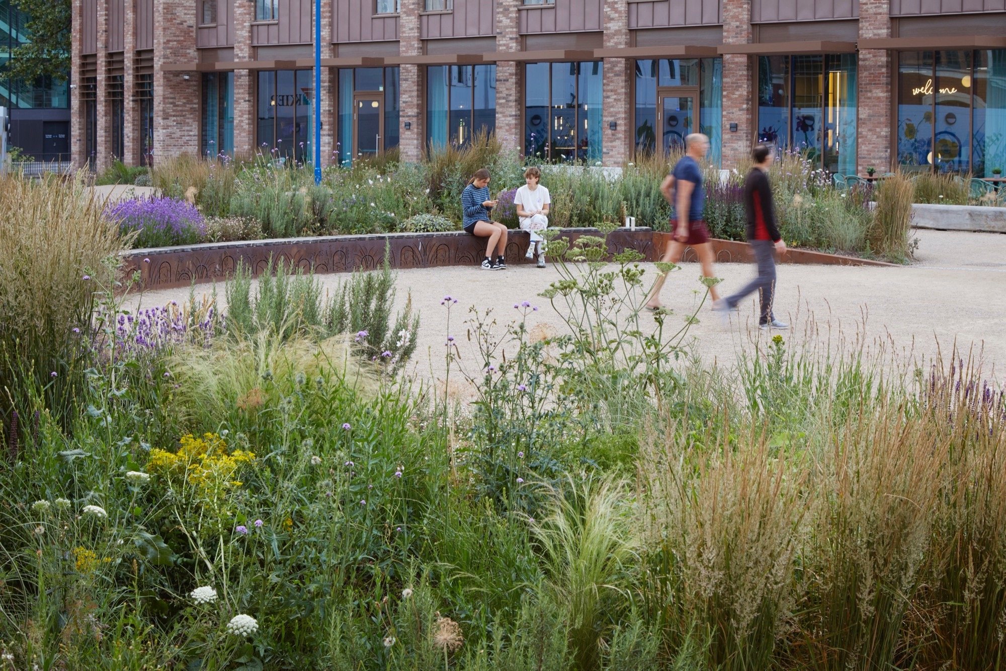 9. Caption. Photo Of Another Site Showing The Type Of Landscaping Being Proposed